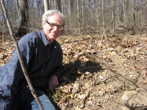 Sean Solomon with blooming Bloodroot in Morris Park, Philadelphia Pa Sean Solomon with blooming Bloodroot in Morris Park, Philadelphia Pa