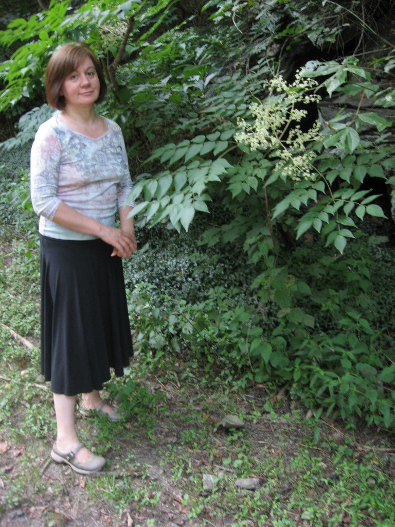 Isabelle Dijols with a blooming Japanese Angelica Tree, Wissahickon Valley Park at Lincoln Drive, August 26th 2012